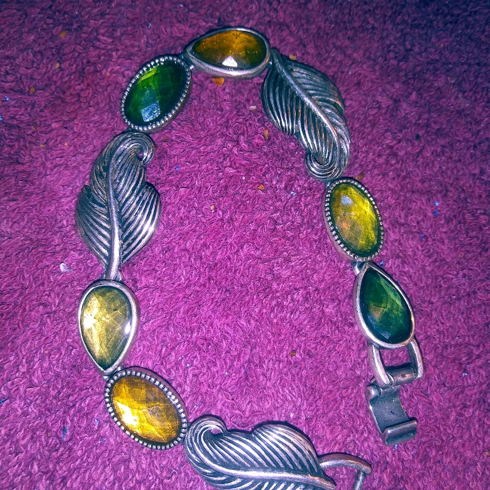Vintage silver leaf with yellow and green stones